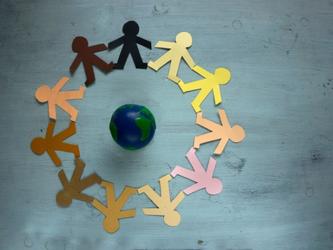 Wooden figures of different colours representing the concept of diversity